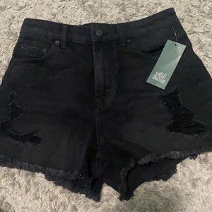 black Jean shorts with rips